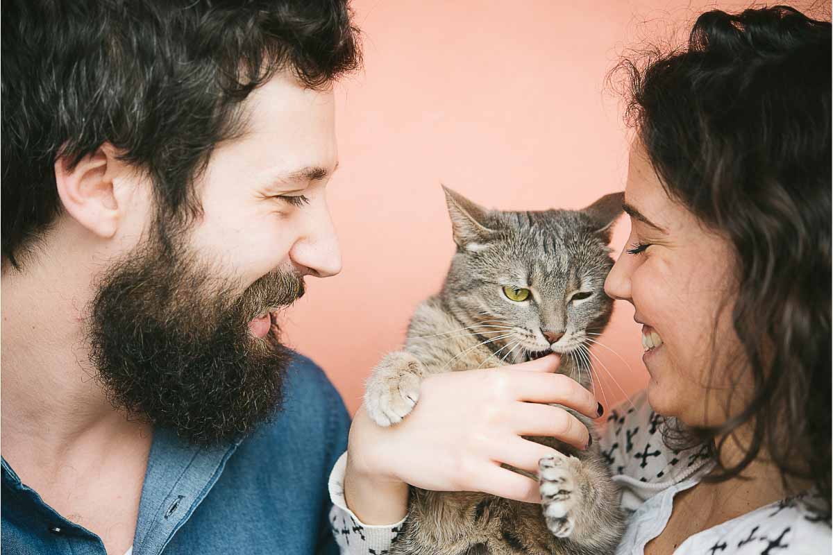 couple with tabby cat