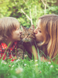 mum and son with cat